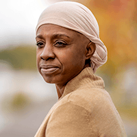 Chemo side effects woman in head scarf square